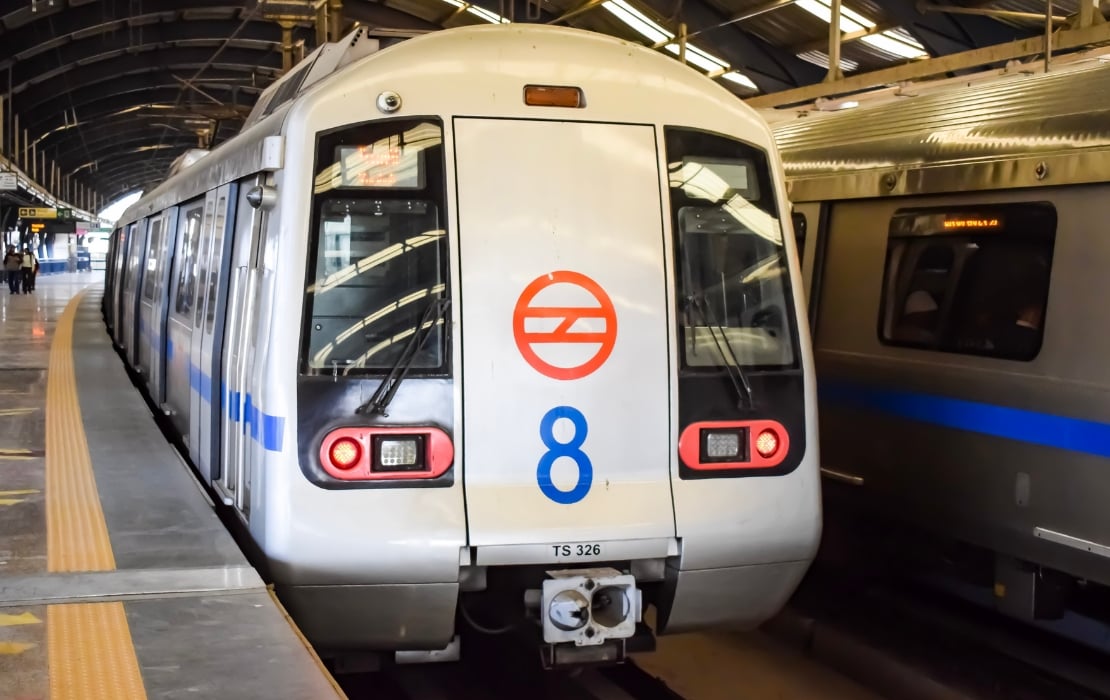 delhi metro train at station