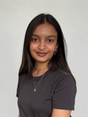 A portrait of Nishma Patel against a white background