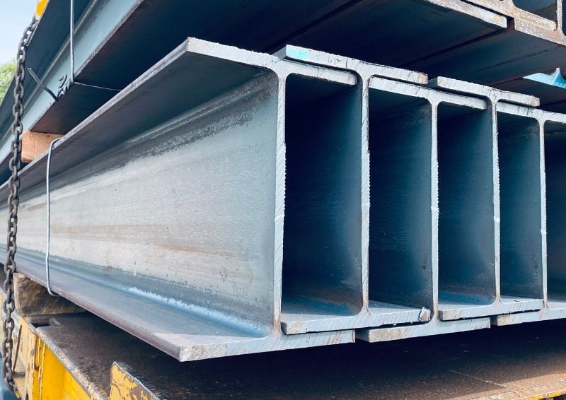 From components to structures: managing global tolerances in structural steel construction