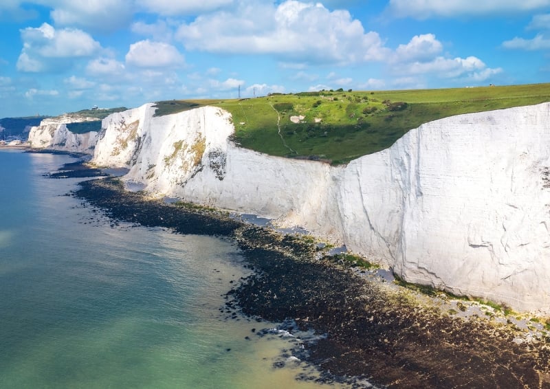 The White Cliffs of Dover owe their striking appearance to their chalky composition. Image credit: Shutterstock